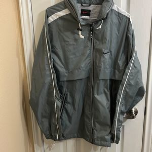 Nike‘s Gray Windbreaker Jacket￼ with Hoodie. Size M